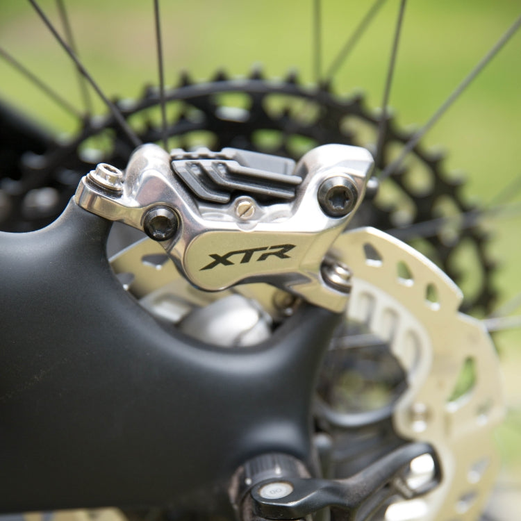 Srebrny zacisk hamulca tarczowego SHIMANO XTR M9120