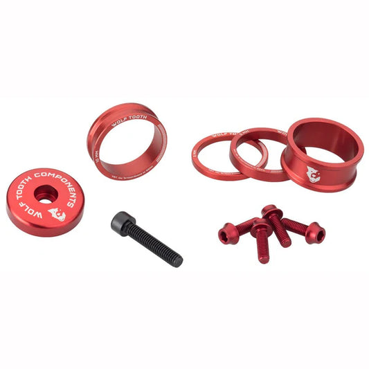 Sats med distanser, skaftskydd och skruvar WOLFTOOTH BLING KIT Röd