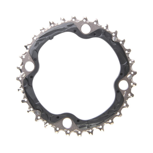 Plateau Intermédiaire SHIMANO SLX M660/670/XT M780 10V 4 Trous 104mm — vue du plateau sur fond blanc