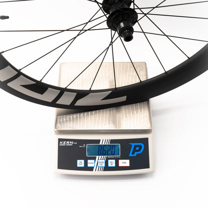 Paire de Roues ZIPP 303 XPLR S Tubeless Ready (Center Lock) Noir/Blanc