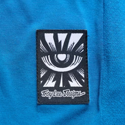 TROY LEE DESIGNS SKYLINE RIDE ONE EYE AERO Juniorský dres s krátkým rukávem modrý