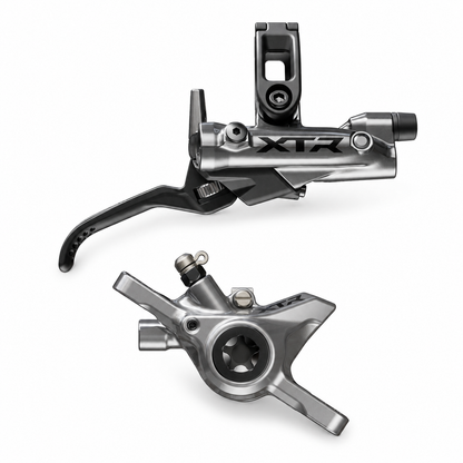 Frein SHIMANO XTR M9220/9200 XC/Trail 2 pistons — levier et étrier sur fond blanc